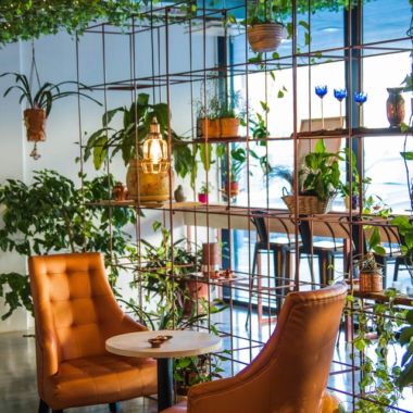 The design is topped with a seat pad with fabric